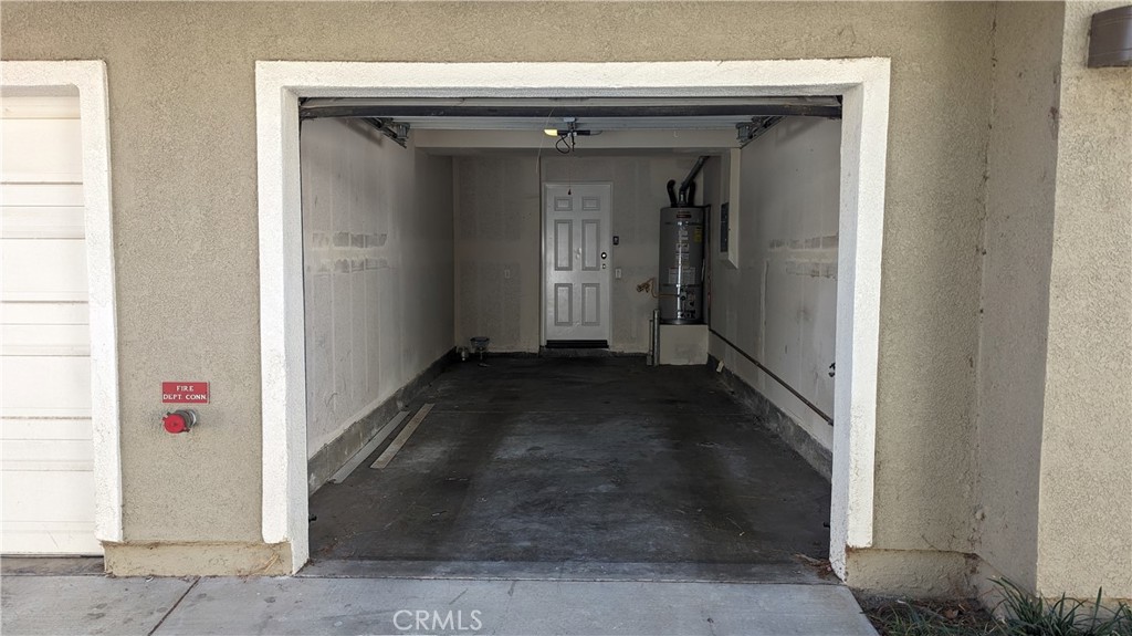 25862 Iris Avenue, Unit B Moreno Valley, CA 92551 - Photo 23 of 23 a view of a hallway with wooden shelves