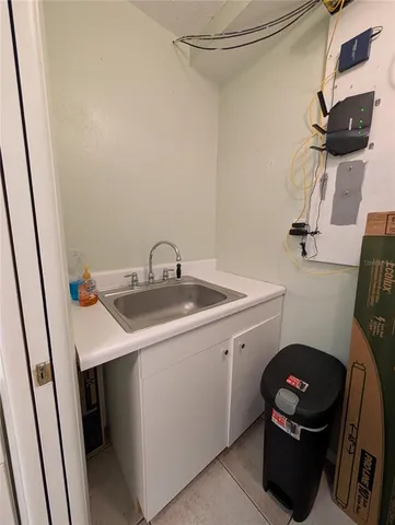 a bathroom with a sink toilet and vanity