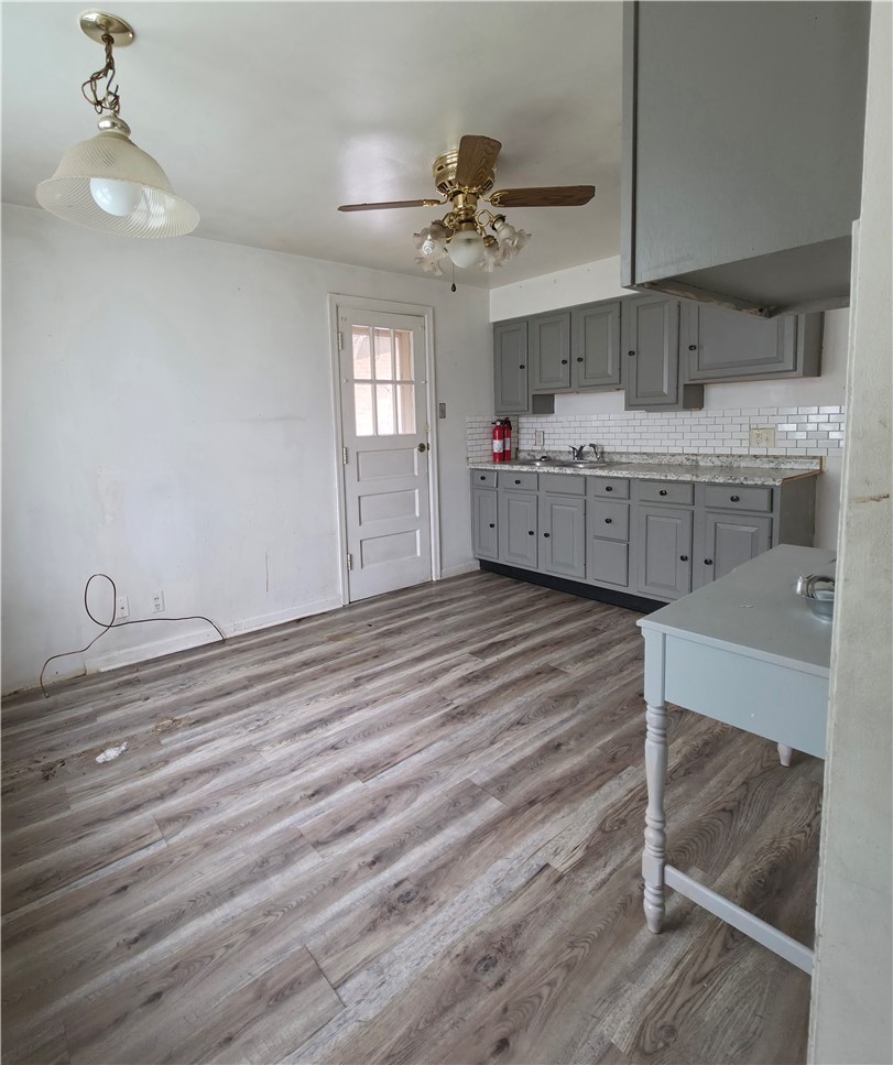 3109 Shroyer Road Kettering, OH 45429 - Photo 12 of 25 This kitchen space offers a clean palette with modern updates and durable flooring.