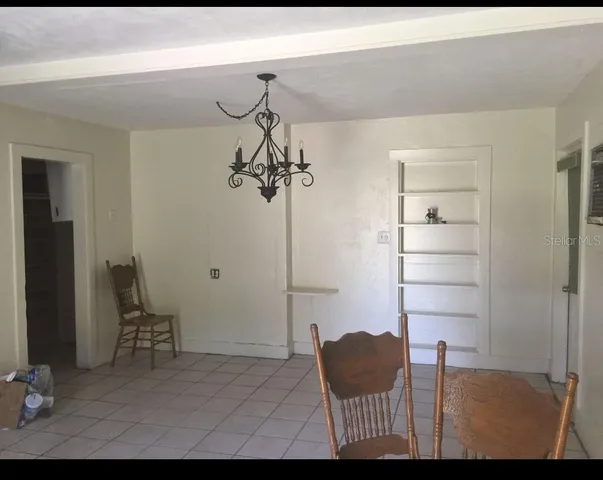 a living room with furniture and a couch