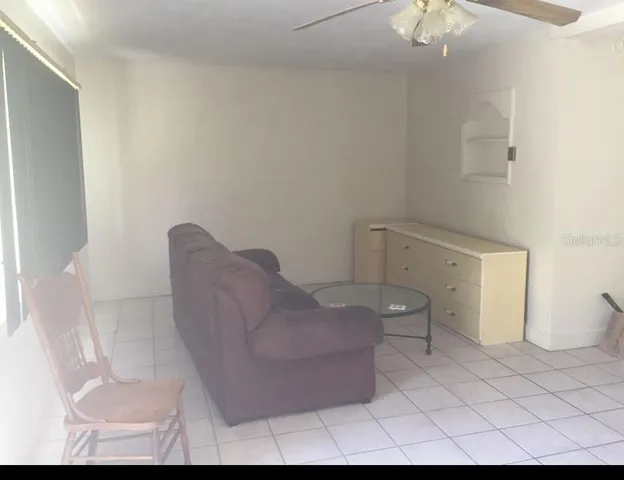 a view of a livingroom with furniture