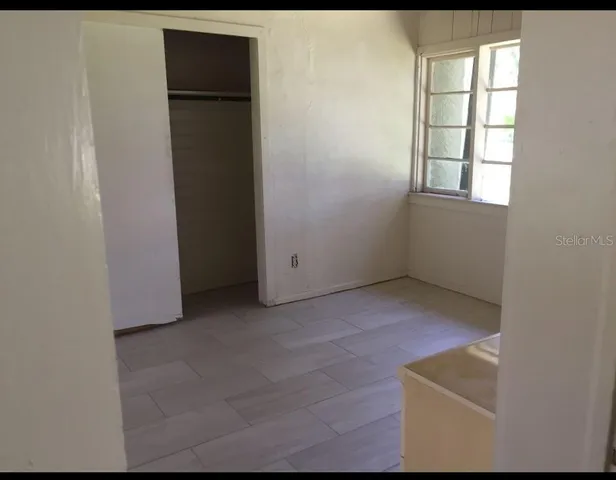 an empty room with a window