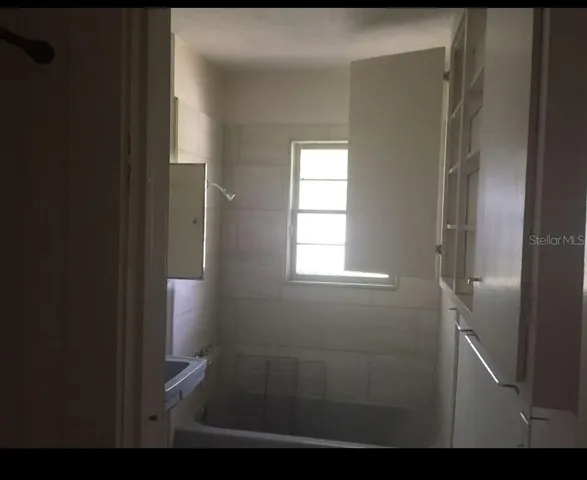 a bathroom with a window