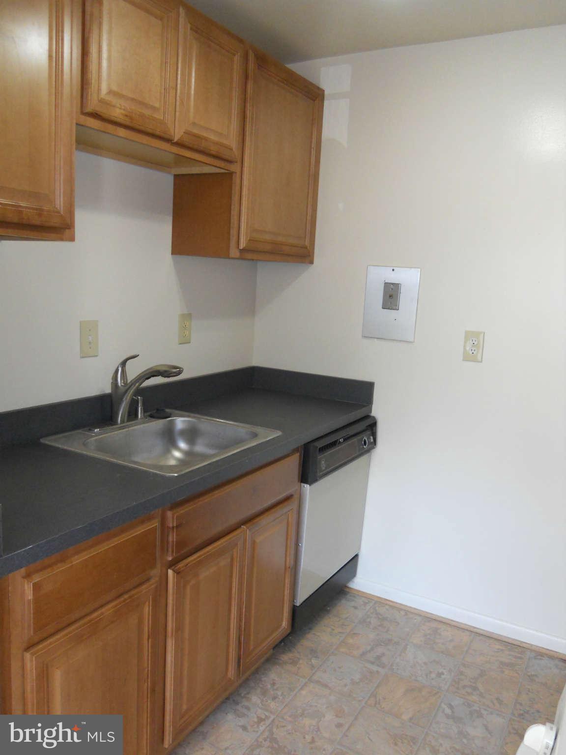7093 Spring Garden Drive, Unit 102 Springfield, VA 22150 - Photo 5 of 14 Kitchen