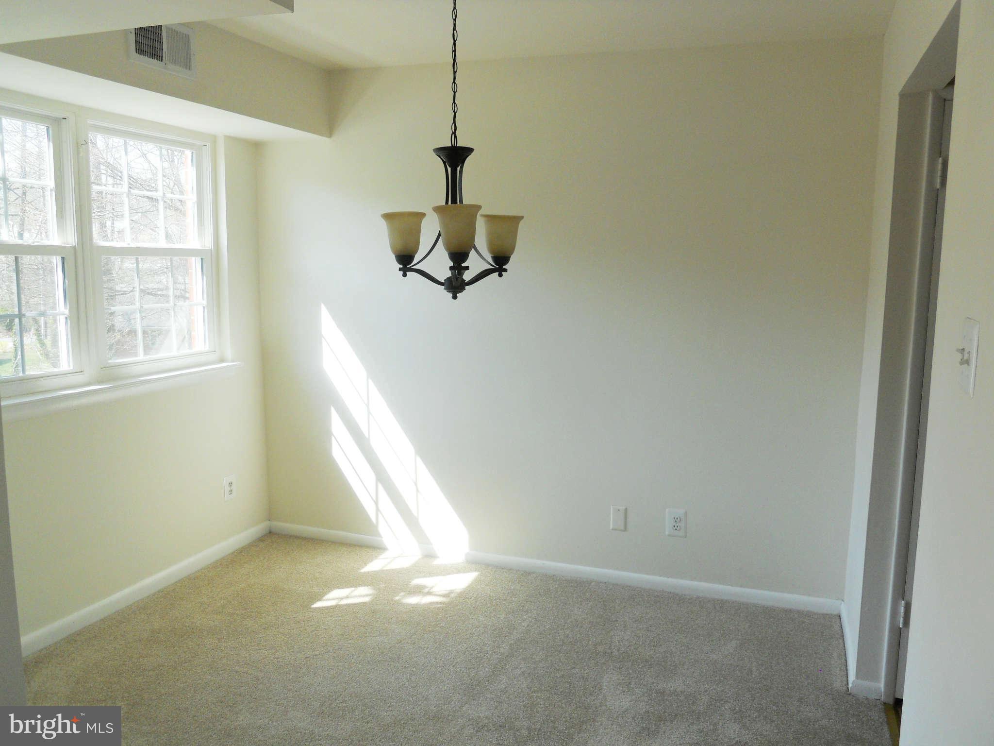7093 Spring Garden Drive, Unit 102 Springfield, VA 22150 - Photo 6 of 14 Dining Room