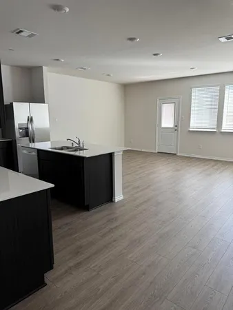 a view of workspace with wooden floor
