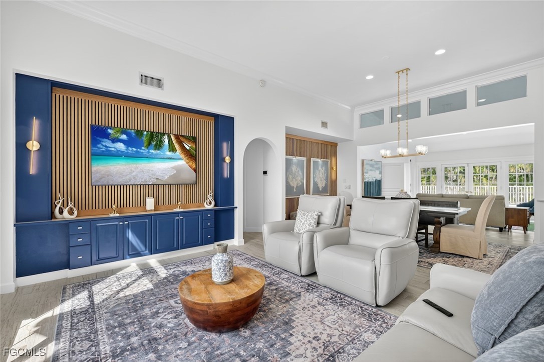 13570 Harbour Ridge Drive Fort Myers, FL 33908 - Photo 5 of 50 a living room with furniture and a flat screen tv