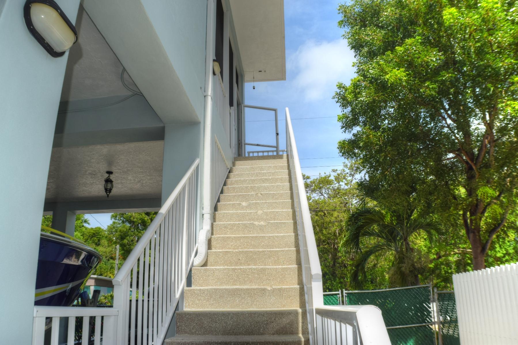 242 Cuba Road Tavernier, FL 33070 - Photo 22 of 35 Stairs up to 2nd floor