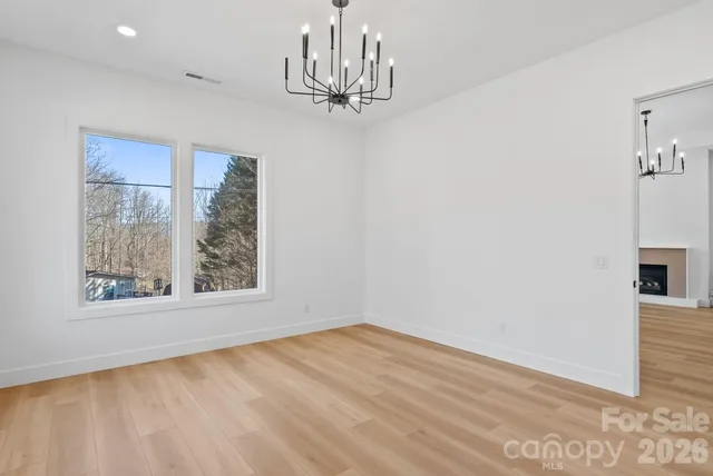 a view of a room with a large window