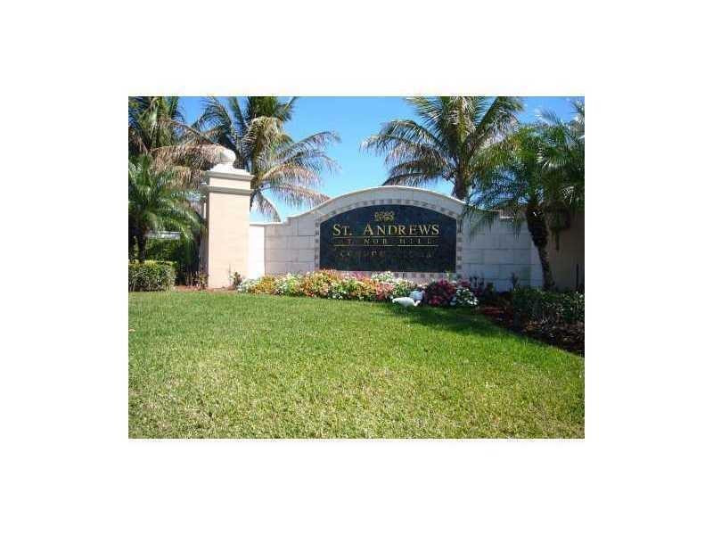 7930 North Nob Hill Road, Unit 106 Tamarac, FL 33321 - Photo 1 of 12 a black and white photo of a book