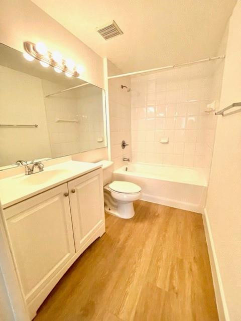 7930 North Nob Hill Road, Unit 106 Tamarac, FL 33321 - Photo 9 of 12 a bathroom with a sink a toilet and shower
