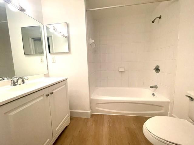 7930 North Nob Hill Road, Unit 106 Tamarac, FL 33321 - Photo 10 of 12 a bathroom with a sink a toilet and bathtub