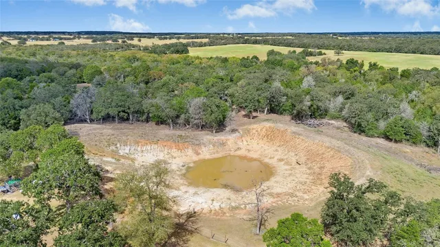 a view of a garage with cars