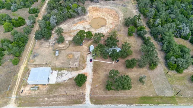 a view of a yard with an ocean