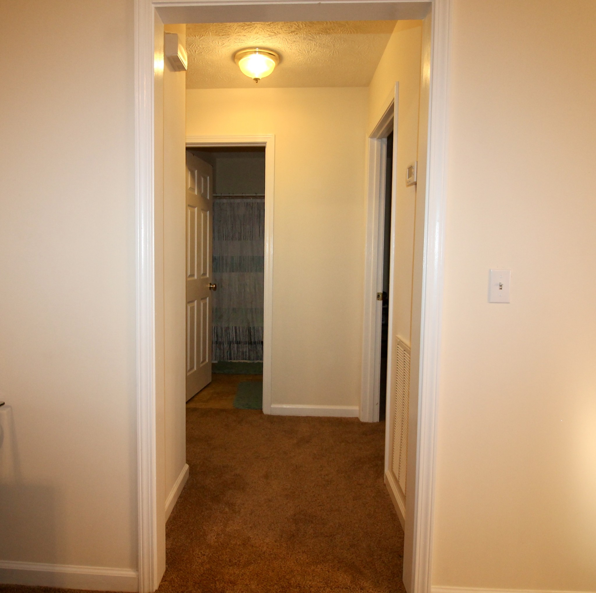 111 Point Road Portland, TN 37148 - Photo 24 of 26 a view of a bathroom with a glass door and a window