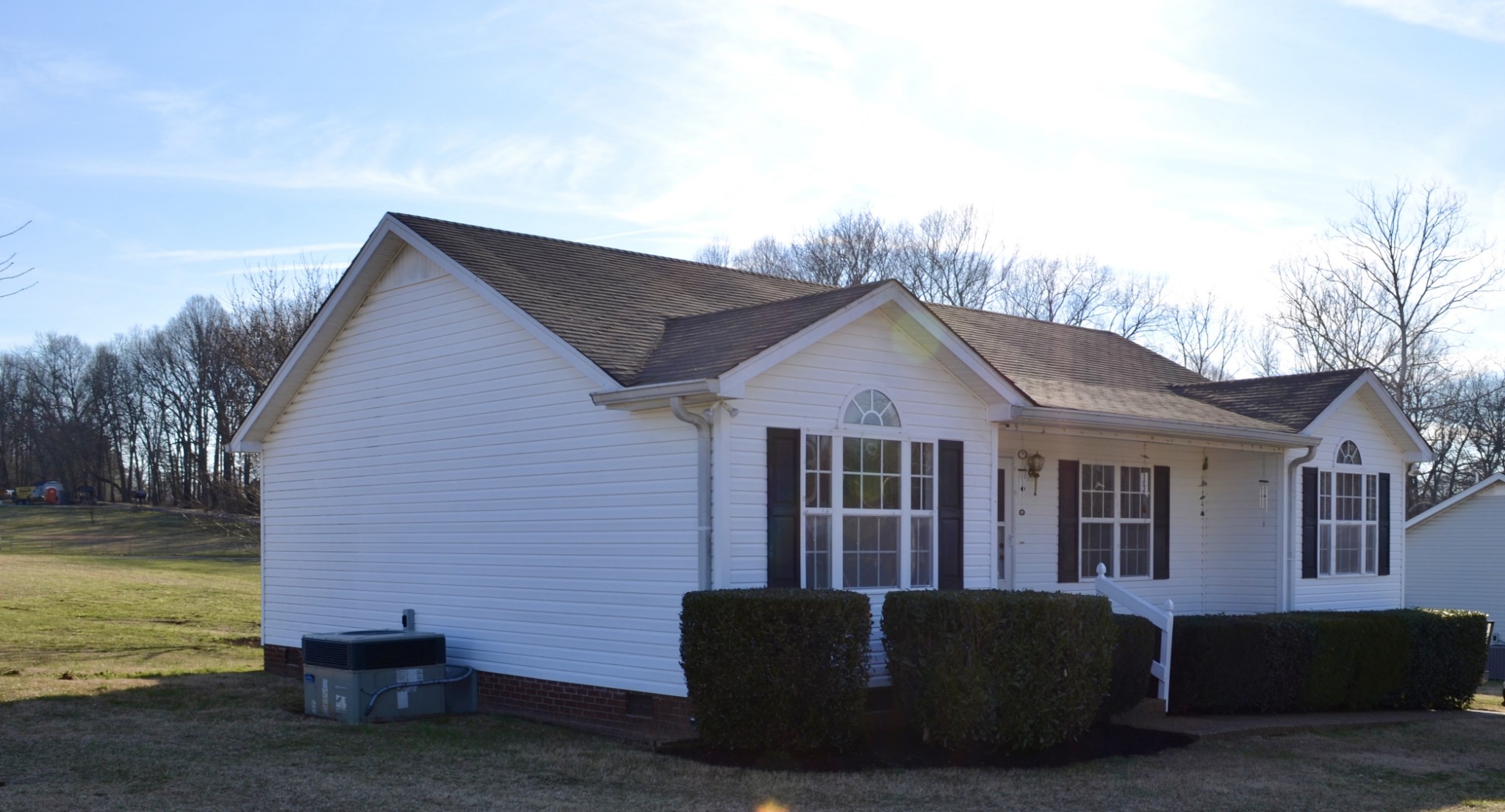 111 Point Road Portland, TN 37148 - Photo 3 of 26 a front view of a house with garden