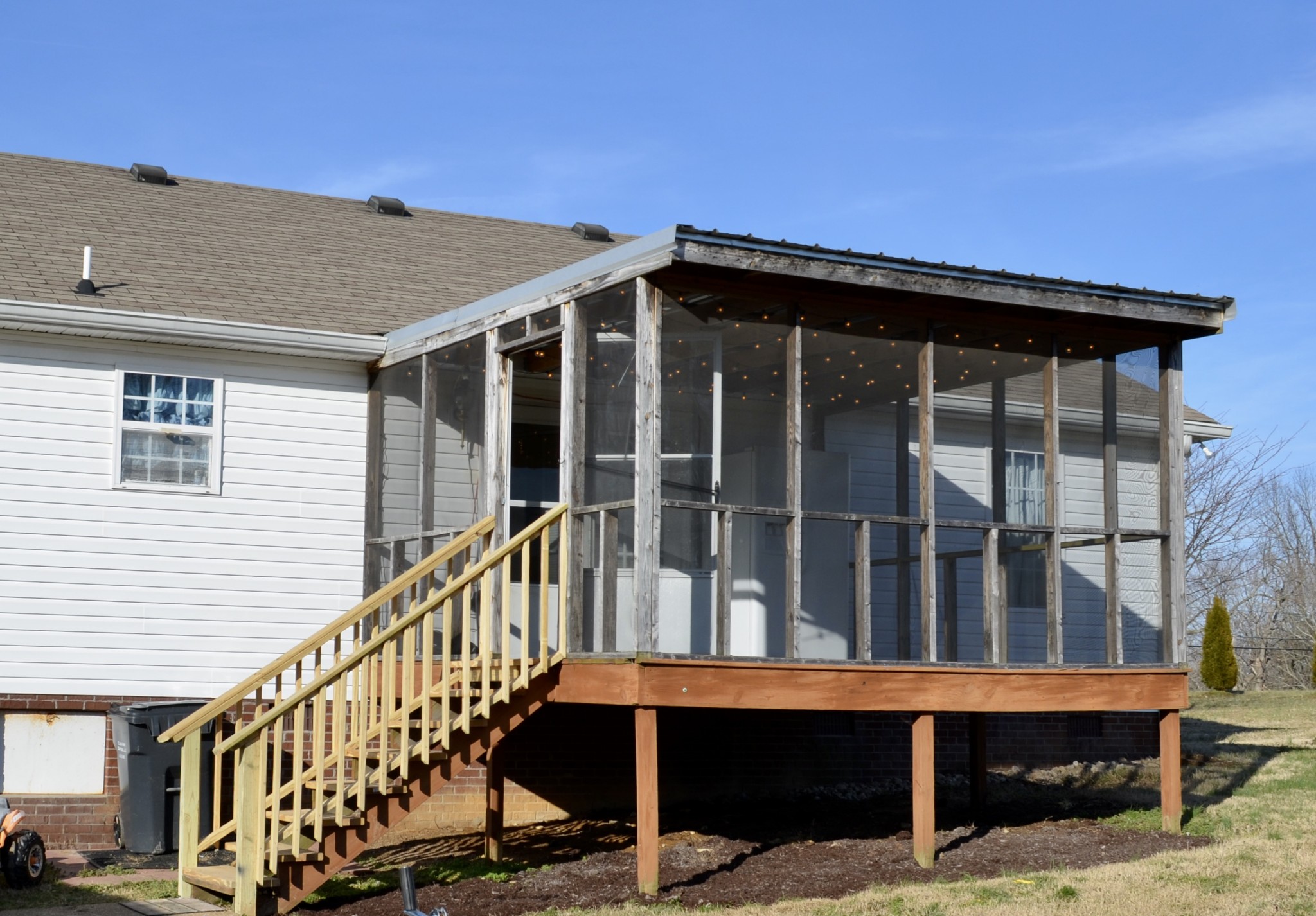 111 Point Road Portland, TN 37148 - Photo 10 of 26 a view of wooden house with large windows