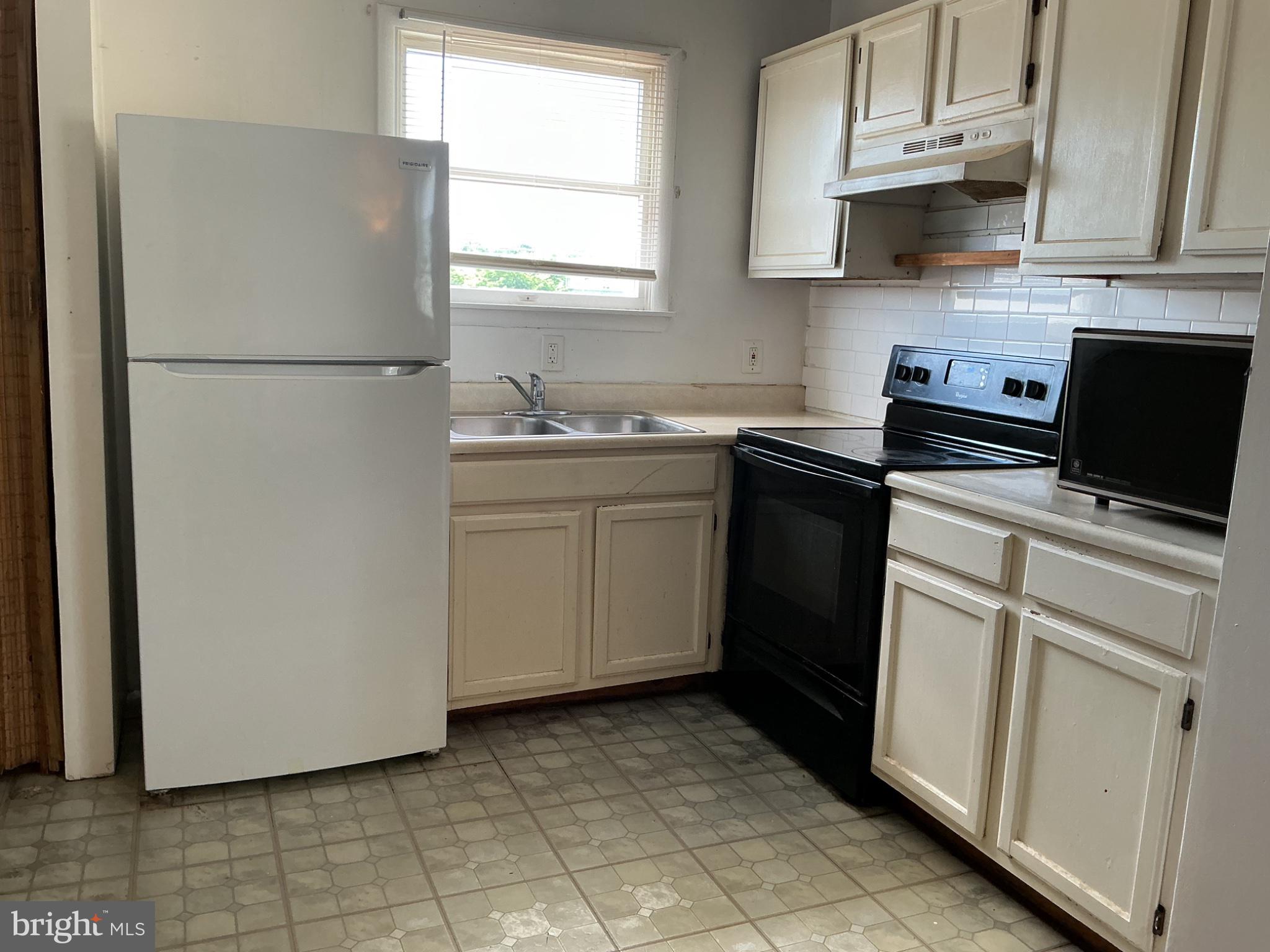 6 Post Road, Unit E Aberdeen, MD 21001 - Photo 8 of 11 Bright and functional kitchen space.