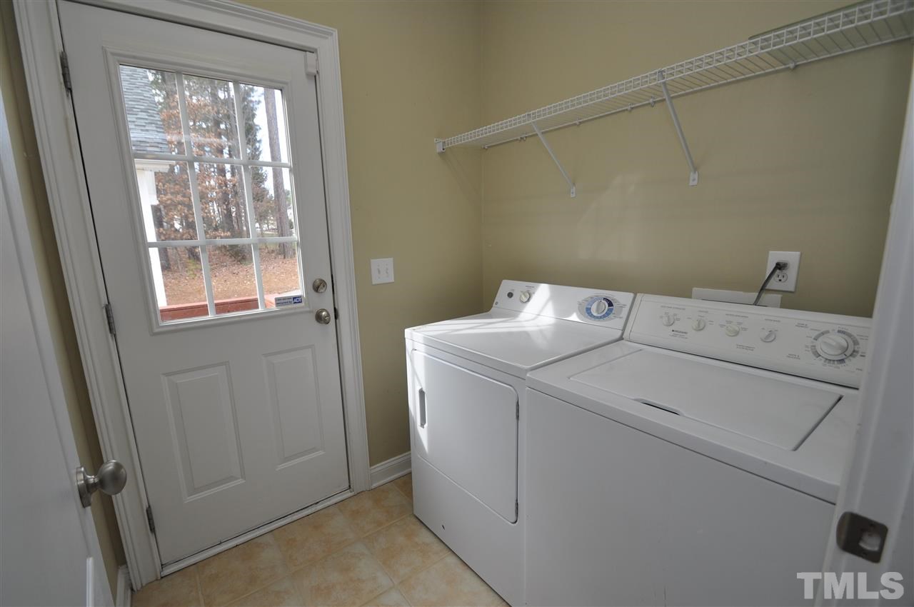 165 Fort Jackson Road Morrisville, NC 27560 - Photo 14 of 25 a utility room with dryer and washer
