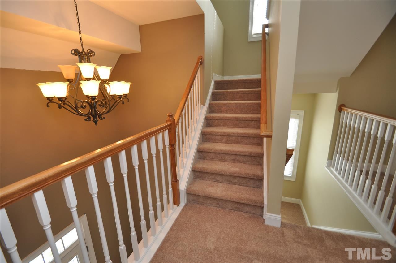 165 Fort Jackson Road Morrisville, NC 27560 - Photo 18 of 25 a view of a hallway with staircase