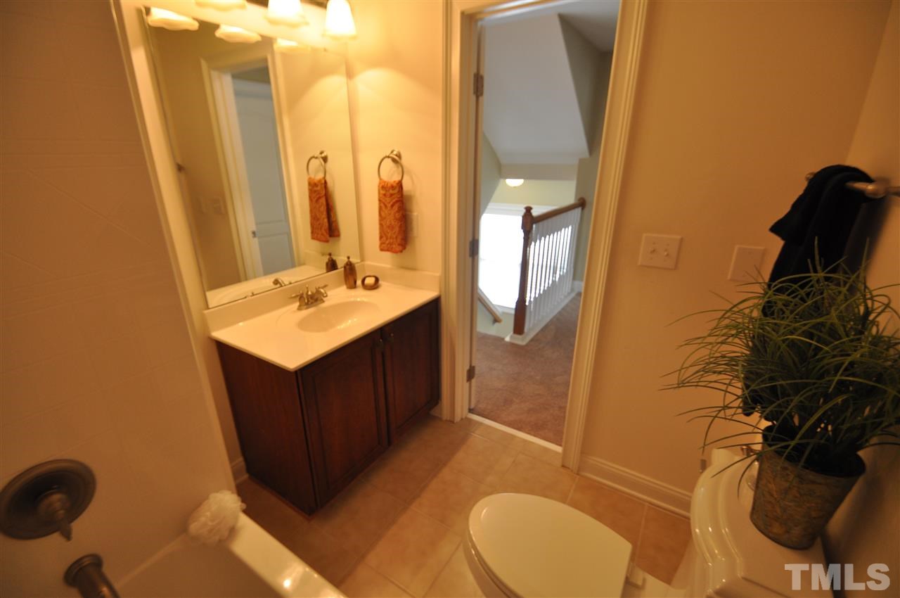 165 Fort Jackson Road Morrisville, NC 27560 - Photo 19 of 25 a bathroom with a sink vanity granite and toilet