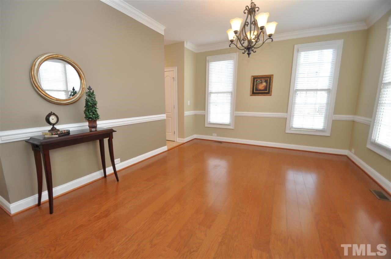 165 Fort Jackson Road Morrisville, NC 27560 - Photo 3 of 25 a view of a room with a mirror and a window