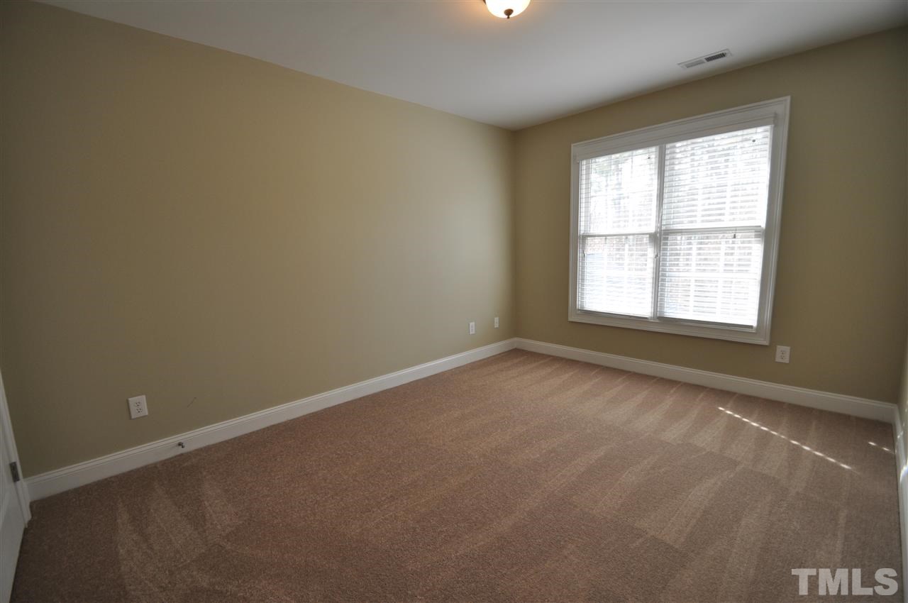 165 Fort Jackson Road Morrisville, NC 27560 - Photo 21 of 25 an empty room with a window