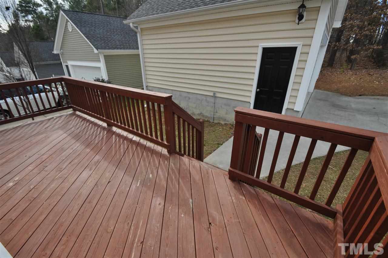 165 Fort Jackson Road Morrisville, NC 27560 - Photo 25 of 25 a view of deck with wooden floor and fence