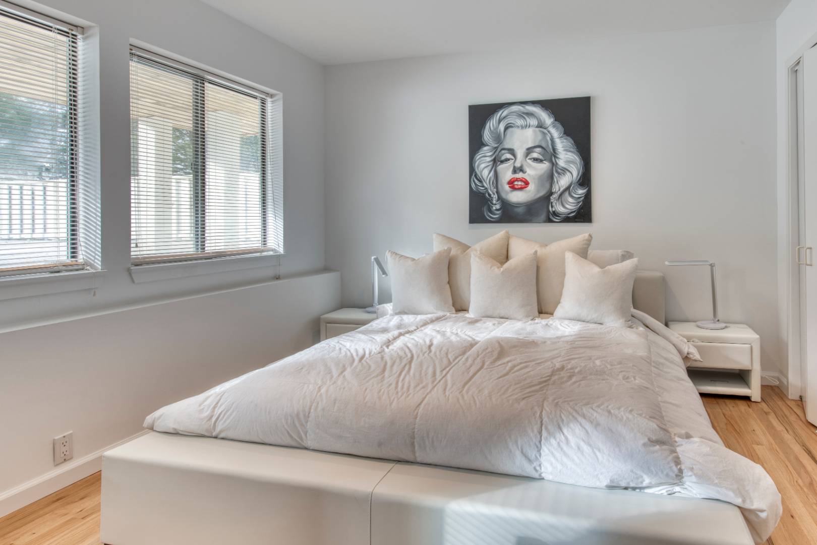 84 Inlet Road East Southampton, NY 11968 - Photo 9 of 13 a bedroom with a bed and a window