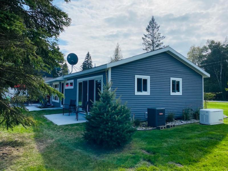5550 Ridge Road Black River, MI 48721 - Photo 54 of 59 Home has whole house Generac and Central Air Conditioning