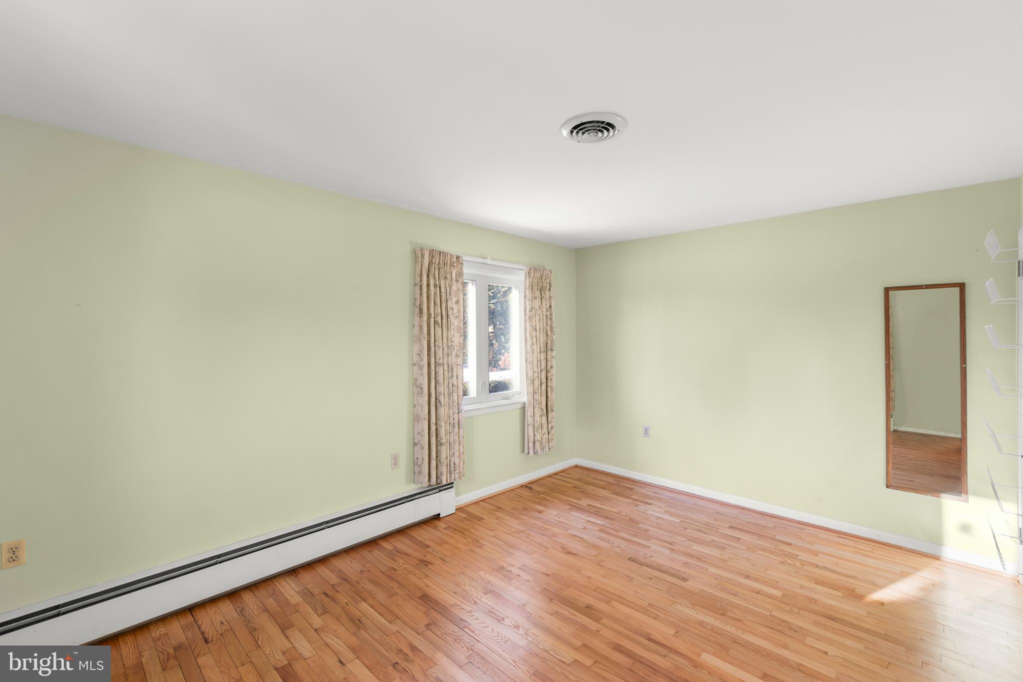307 Fox Drive Winchester, VA 22601 - Photo 20 of 42 Primary bedroom view showing wall space & window