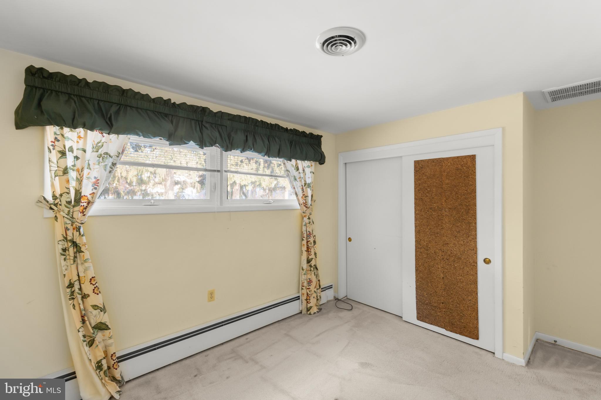 307 Fox Drive Winchester, VA 22601 - Photo 27 of 42 Bedroom 3-view 3-showing closet door & windows