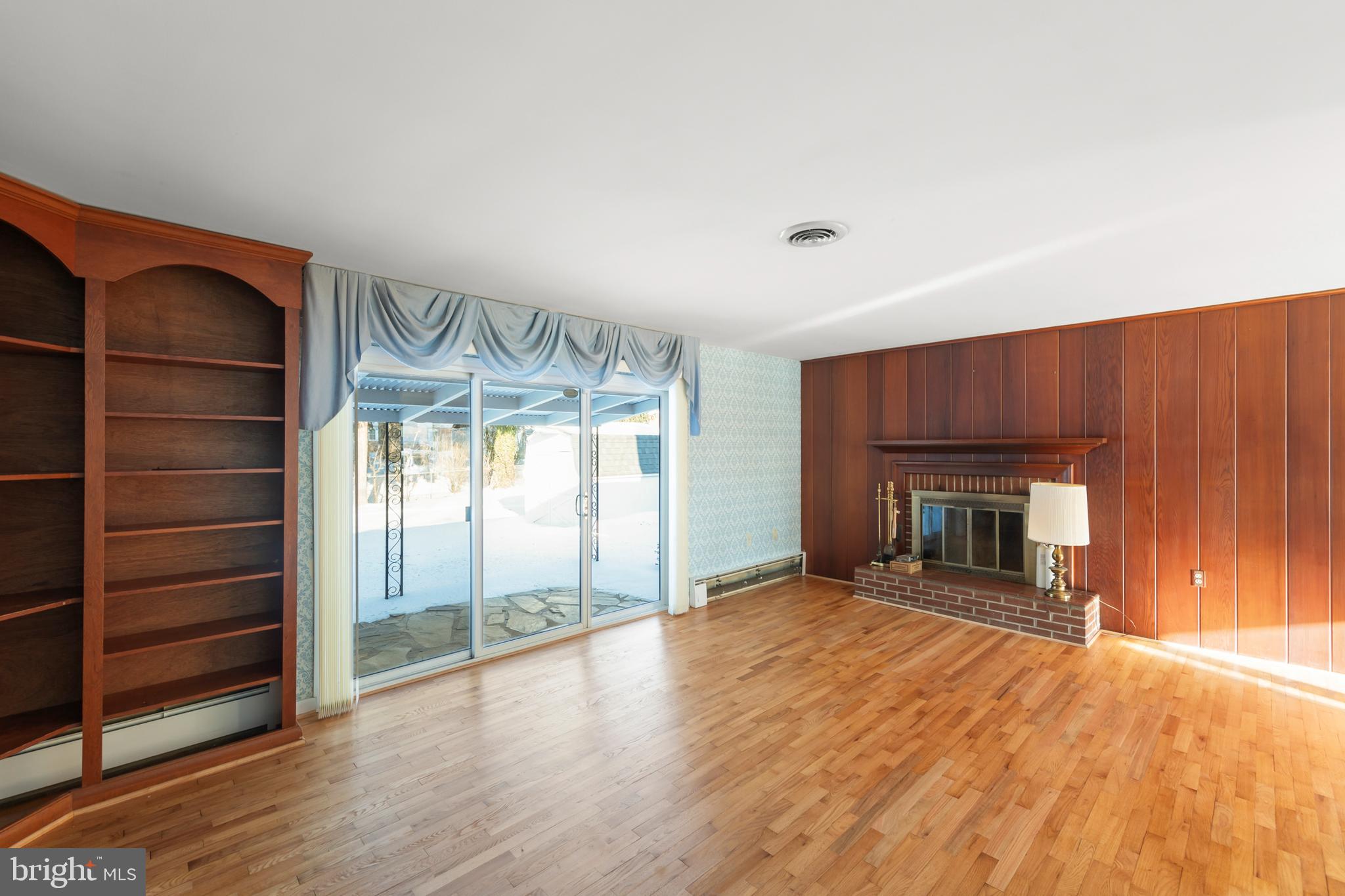 307 Fox Drive Winchester, VA 22601 - Photo 3 of 42 Living room showing fireplace & sliding doors