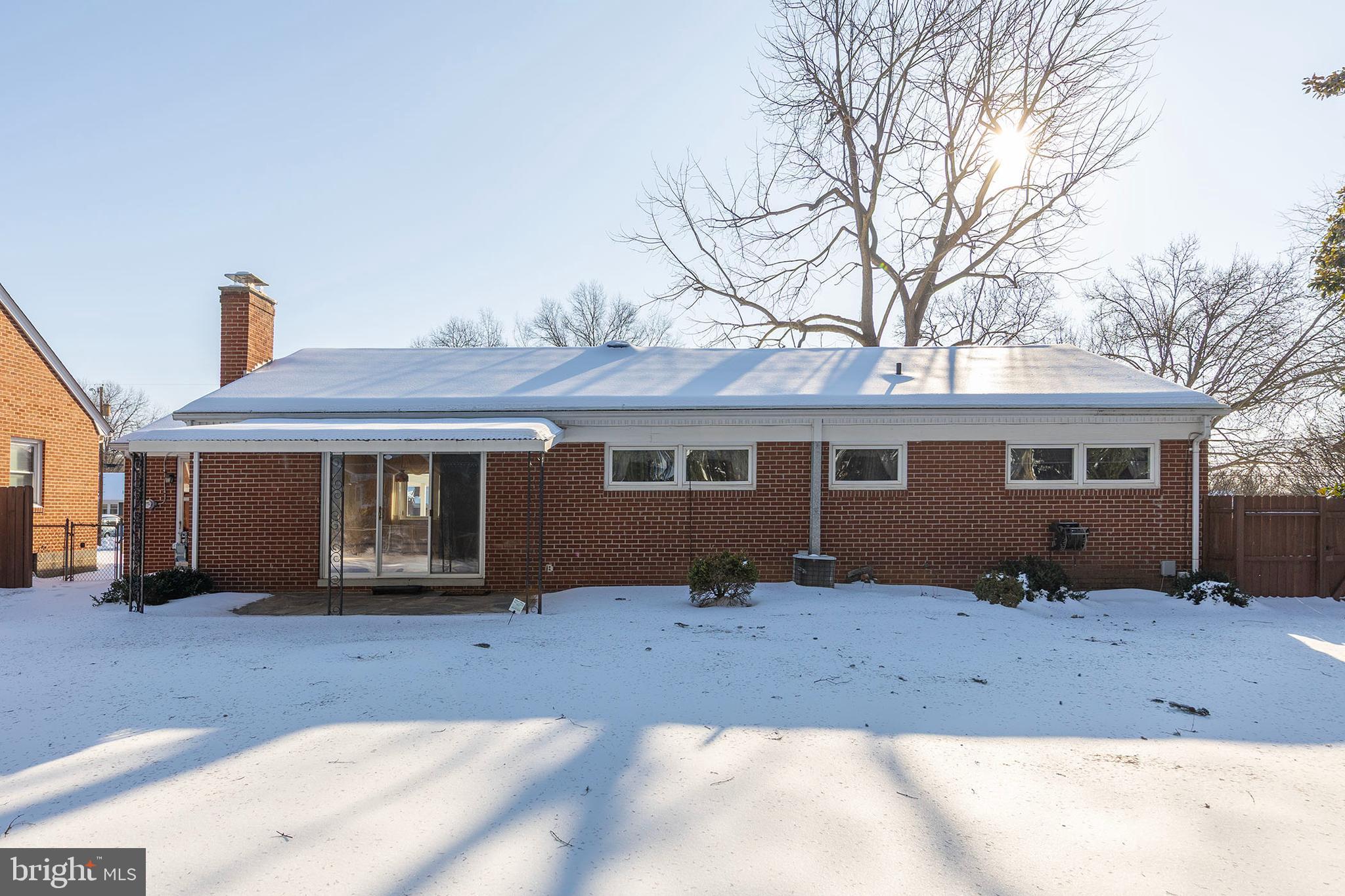 307 Fox Drive Winchester, VA 22601 - Photo 35 of 42 Rear view showing covered patio area