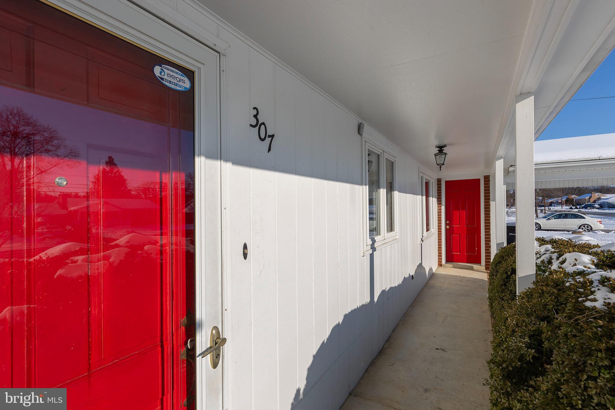 307 Fox Drive Winchester, VA 22601 - Photo 40 of 42 Front porch & door to storage area