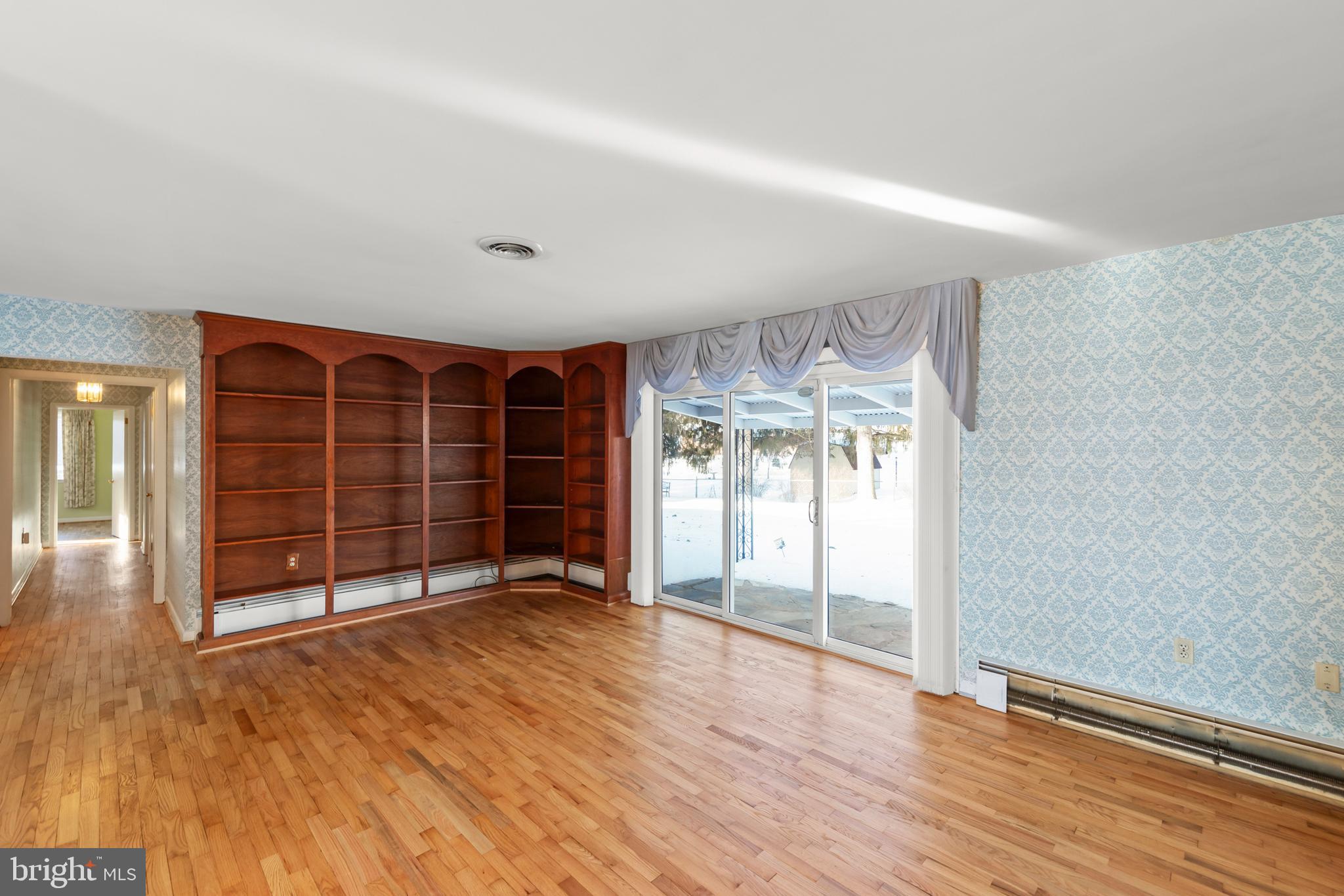 307 Fox Drive Winchester, VA 22601 - Photo 7 of 42 Living room view showing sliders to patio