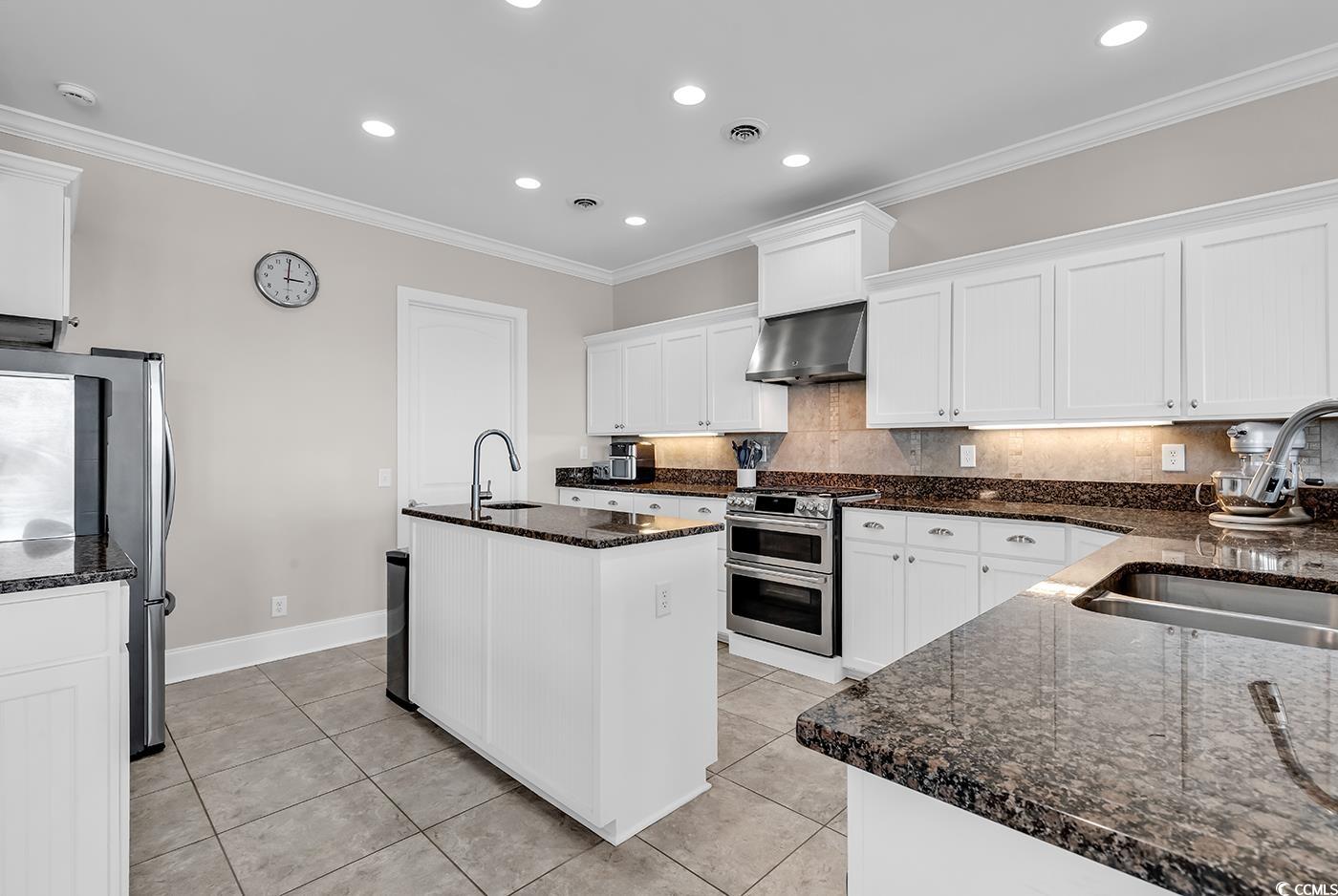 88 Gillette Place Murrells Inlet, SC 29576 - Photo 13 of 40 Kitchen with stainless steel appliances, a sink, e