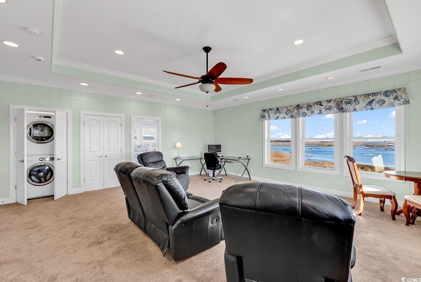 88 Gillette Place Murrells Inlet, SC 29576 - Photo 23 of 40 Living area featuring ornamental molding, a tray c