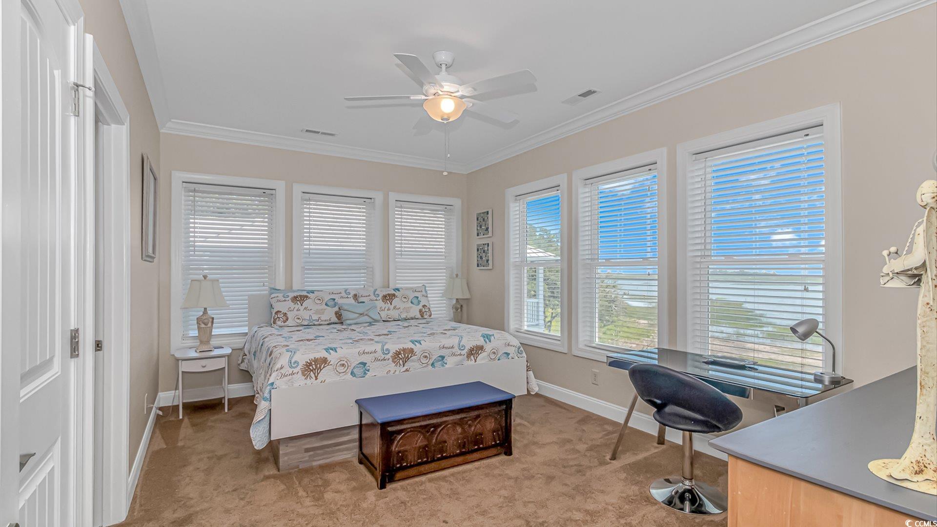 88 Gillette Place Murrells Inlet, SC 29576 - Photo 28 of 40 Carpeted bedroom featuring ornamental molding and