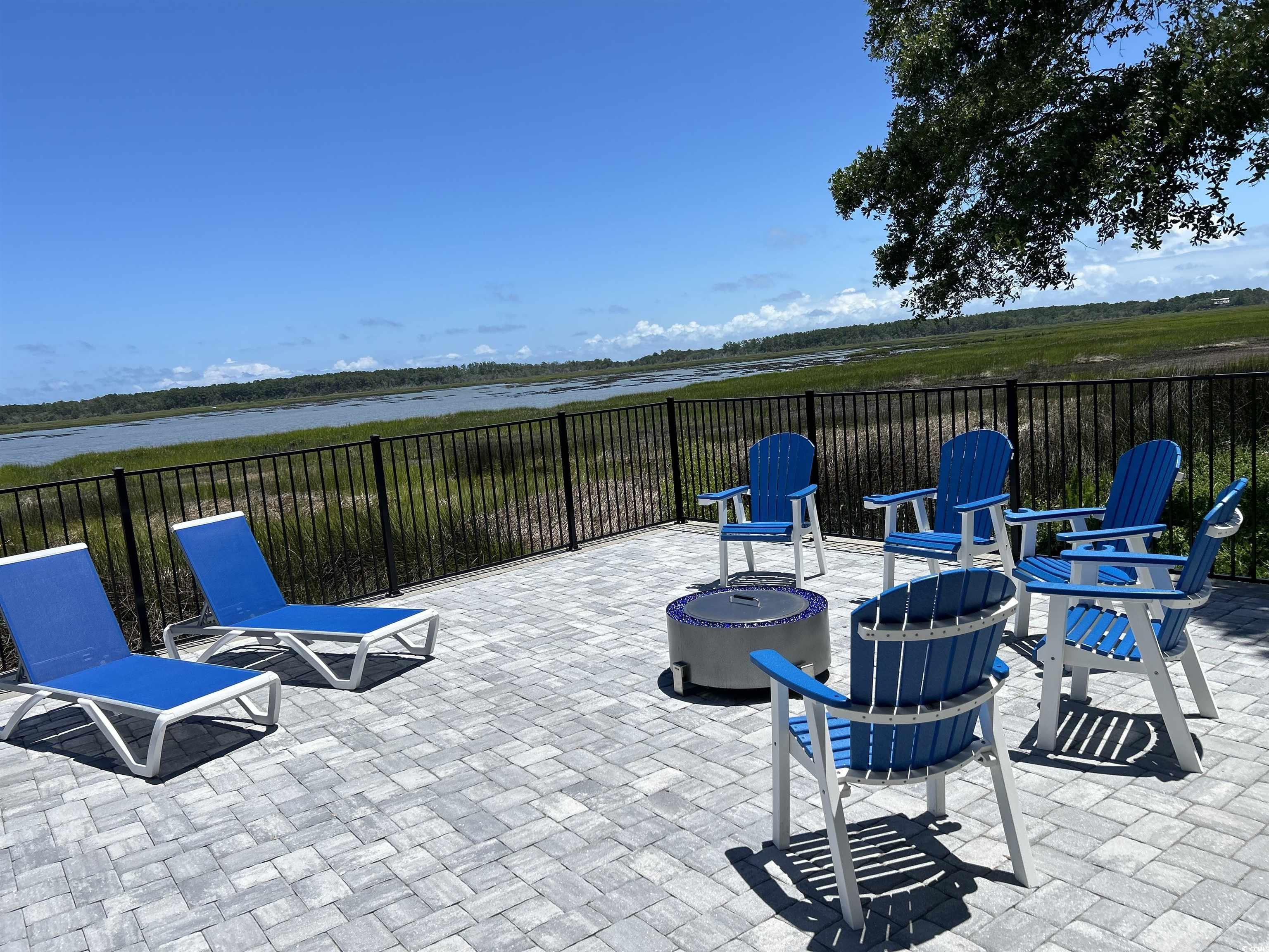 88 Gillette Place Murrells Inlet, SC 29576 - Photo 6 of 40 View of patio / terrace featuring a fire pit and f
