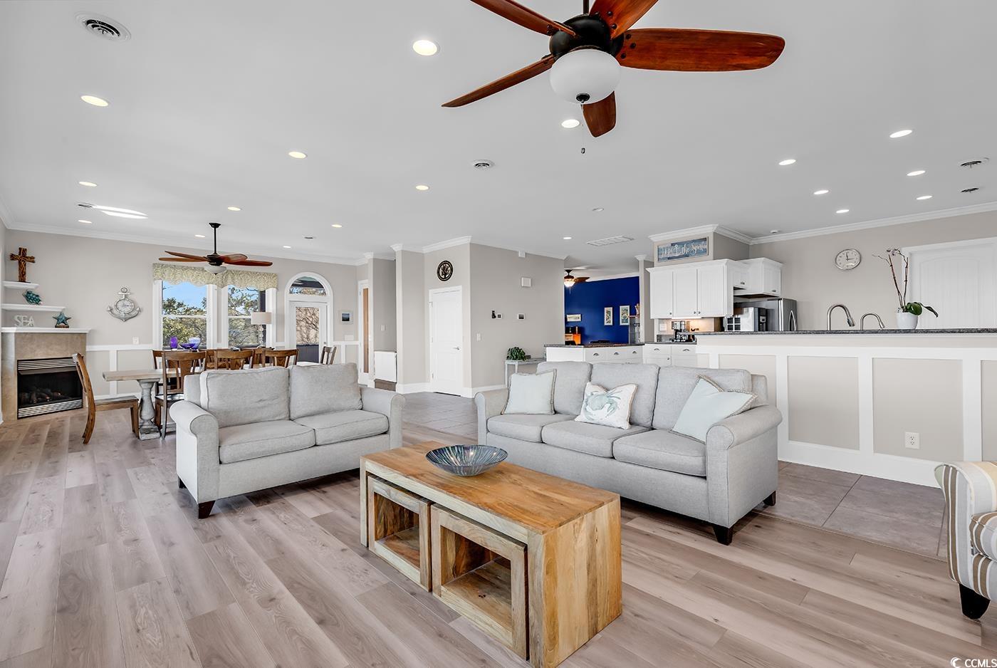 88 Gillette Place Murrells Inlet, SC 29576 - Photo 10 of 40 Living room with recessed lighting, a fireplace, v