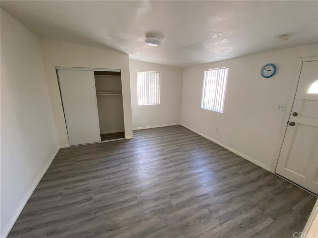 2554 Potrero Avenue El Monte, CA 91733 - Photo 12 of 22 an empty room with wooden floor and window