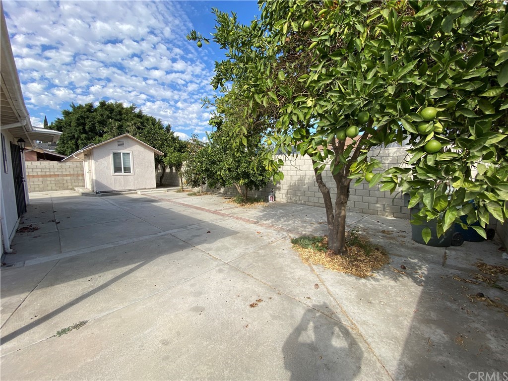 2554 Potrero Avenue El Monte, CA 91733 - Photo 16 of 22 a front view of a house with a yard and garage