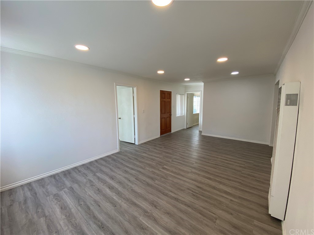 2554 Potrero Avenue El Monte, CA 91733 - Photo 7 of 22 a view of an empty room with wooden floor