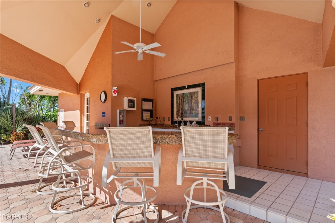 14813 Laguna Drive, Unit 301 Fort Myers, FL 33908 - Photo 48 of 50 a view of a dining room with furniture window and outside view