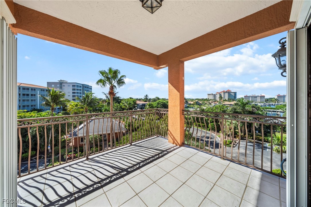 14813 Laguna Drive, Unit 301 Fort Myers, FL 33908 - Photo 49 of 50 a view of balcony with couch
