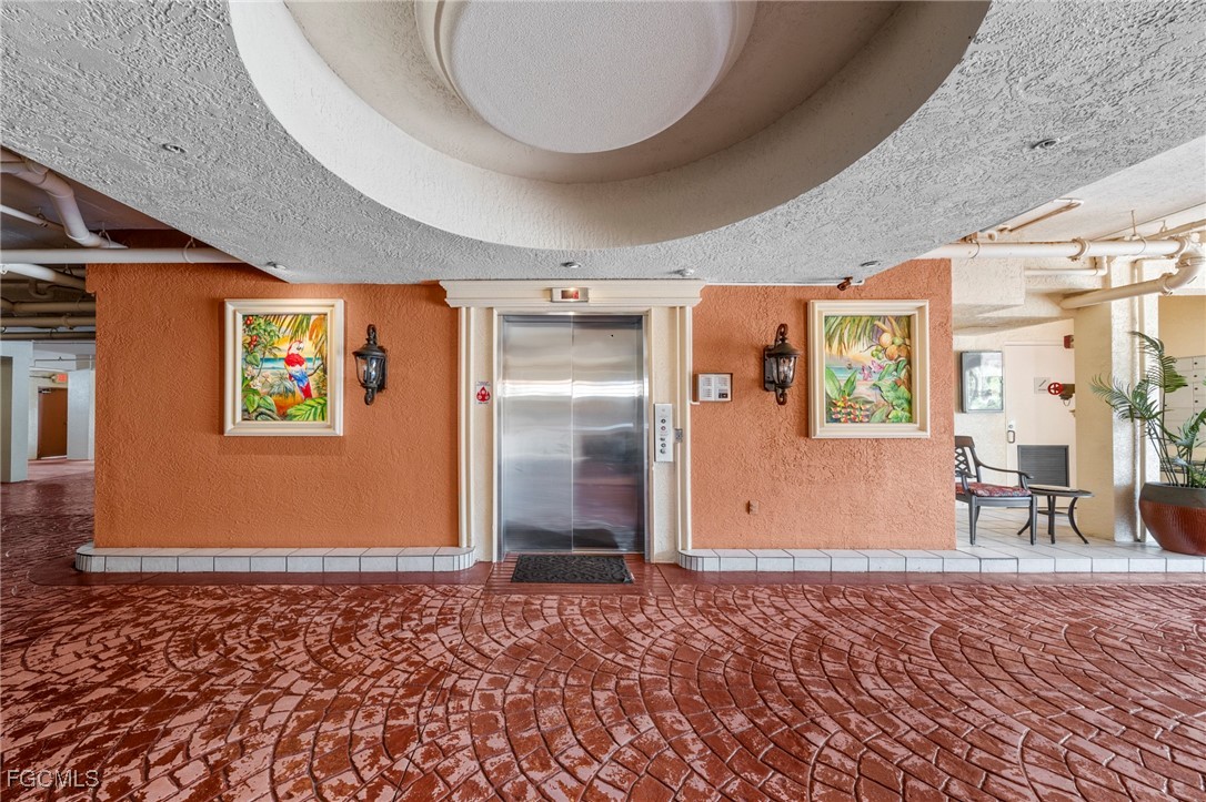 14813 Laguna Drive, Unit 301 Fort Myers, FL 33908 - Photo 50 of 50 an empty room with windows