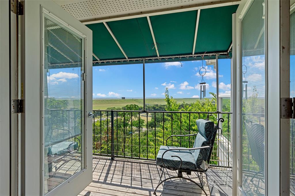 2905 Lake Shore Drive, Unit 204 Waco, TX 76708 - Photo 25 of 32 Patio doors with view of lake