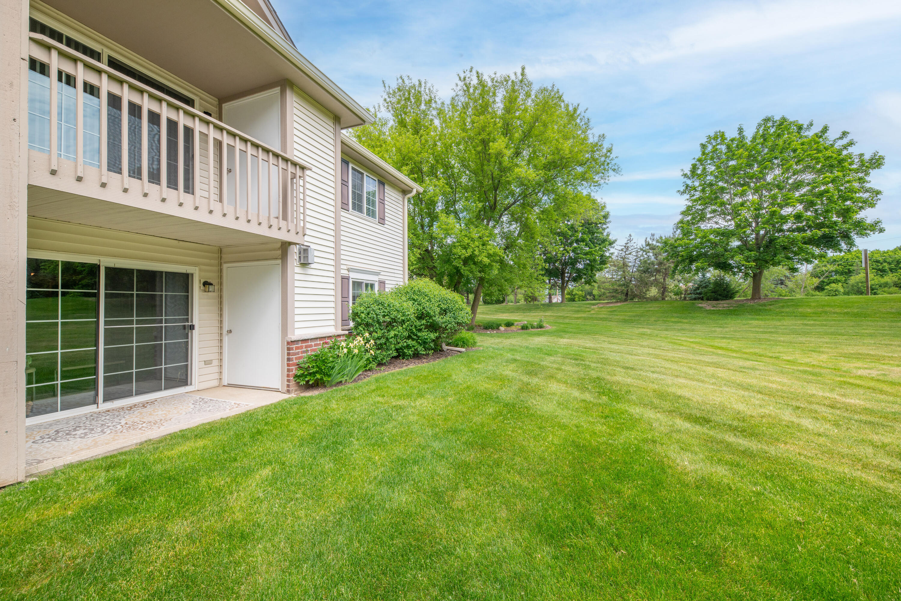 652 Pewaukee Road, Unit A Pewaukee, WI 53072 - Photo 23 of 30 patio overlooking green space