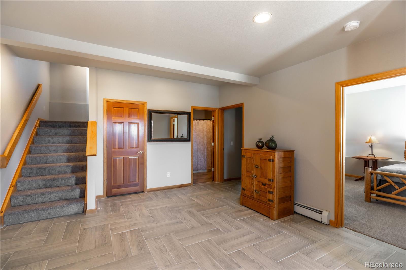 318 Rd D Pine, CO 80470 - Photo 31 of 50 a view of a livingroom with furniture and stairs